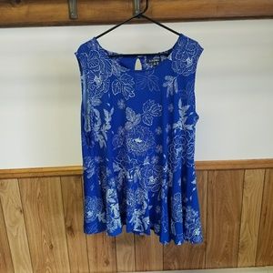 Navy blue top with white flowers and dots